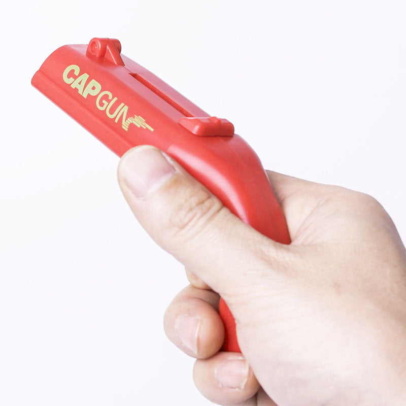 Pistol Shaped Bottle Opener & Cap Launcher