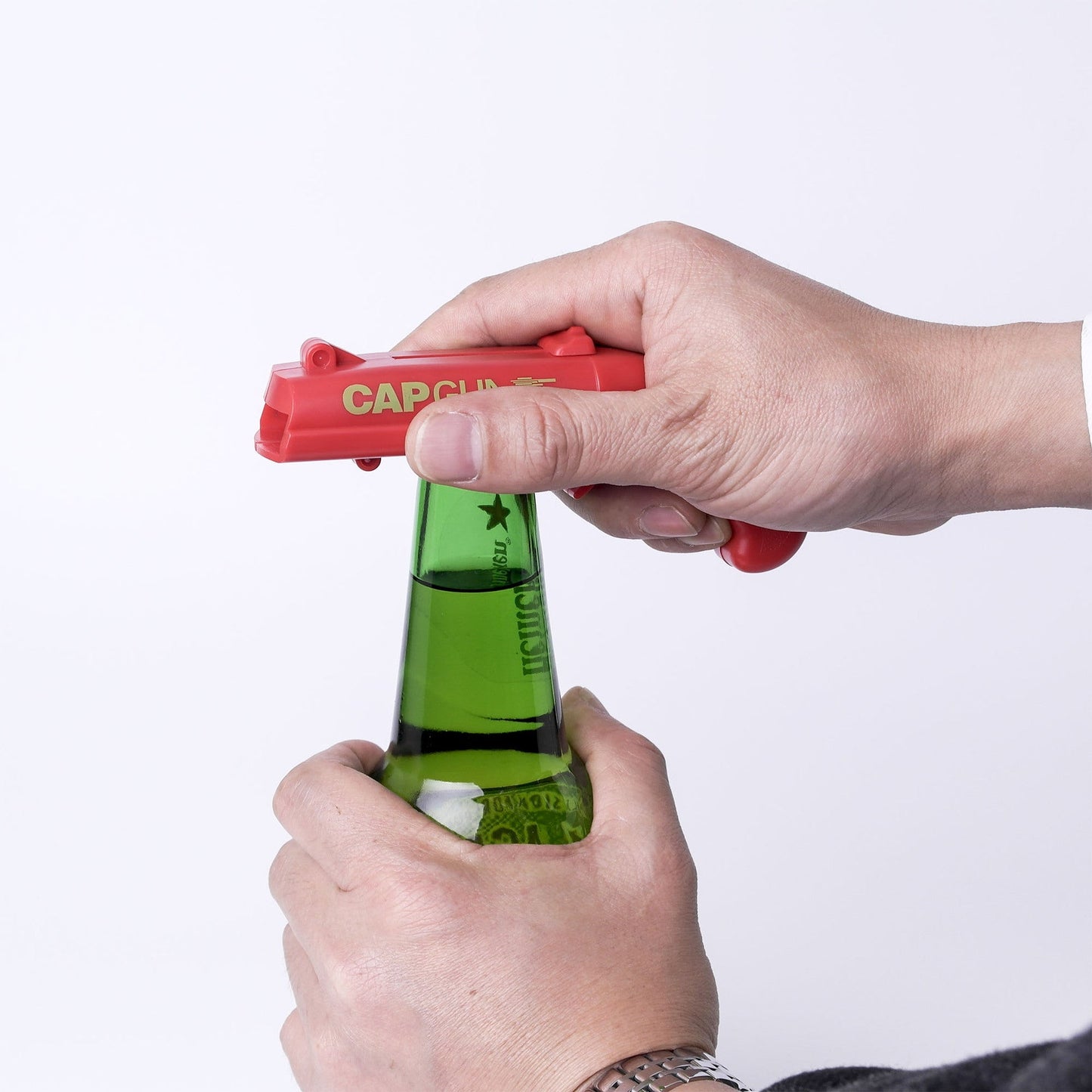 Pistol Shaped Bottle Opener & Cap Launcher